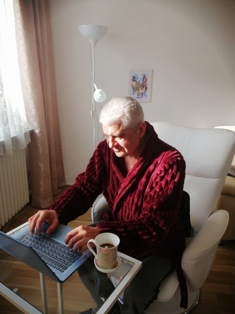 senior in home office