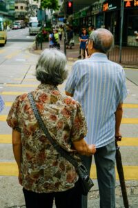 Senior couple crossing the street