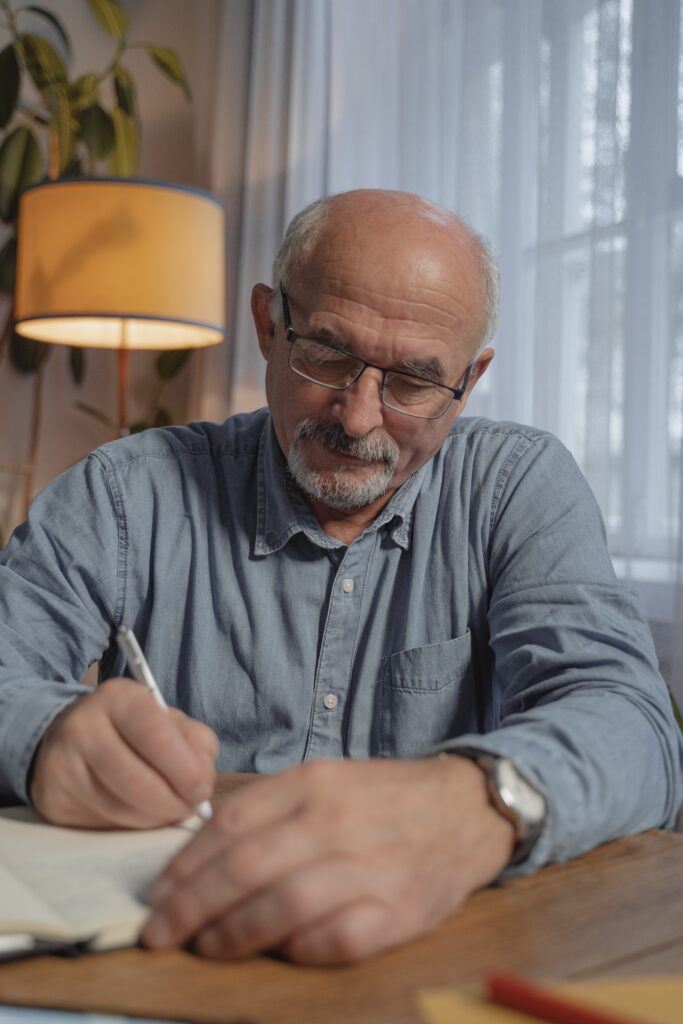 senior at desk